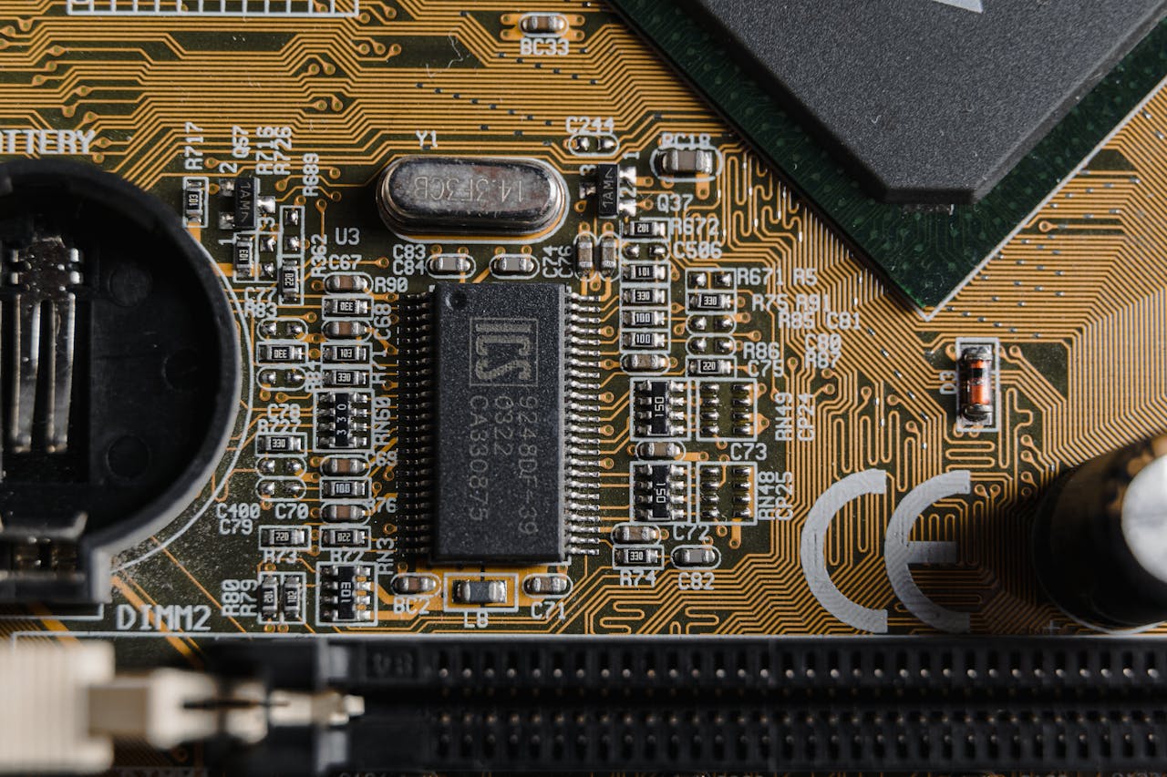 About Detailed view of circuit components on a printed circuit board (PCB).